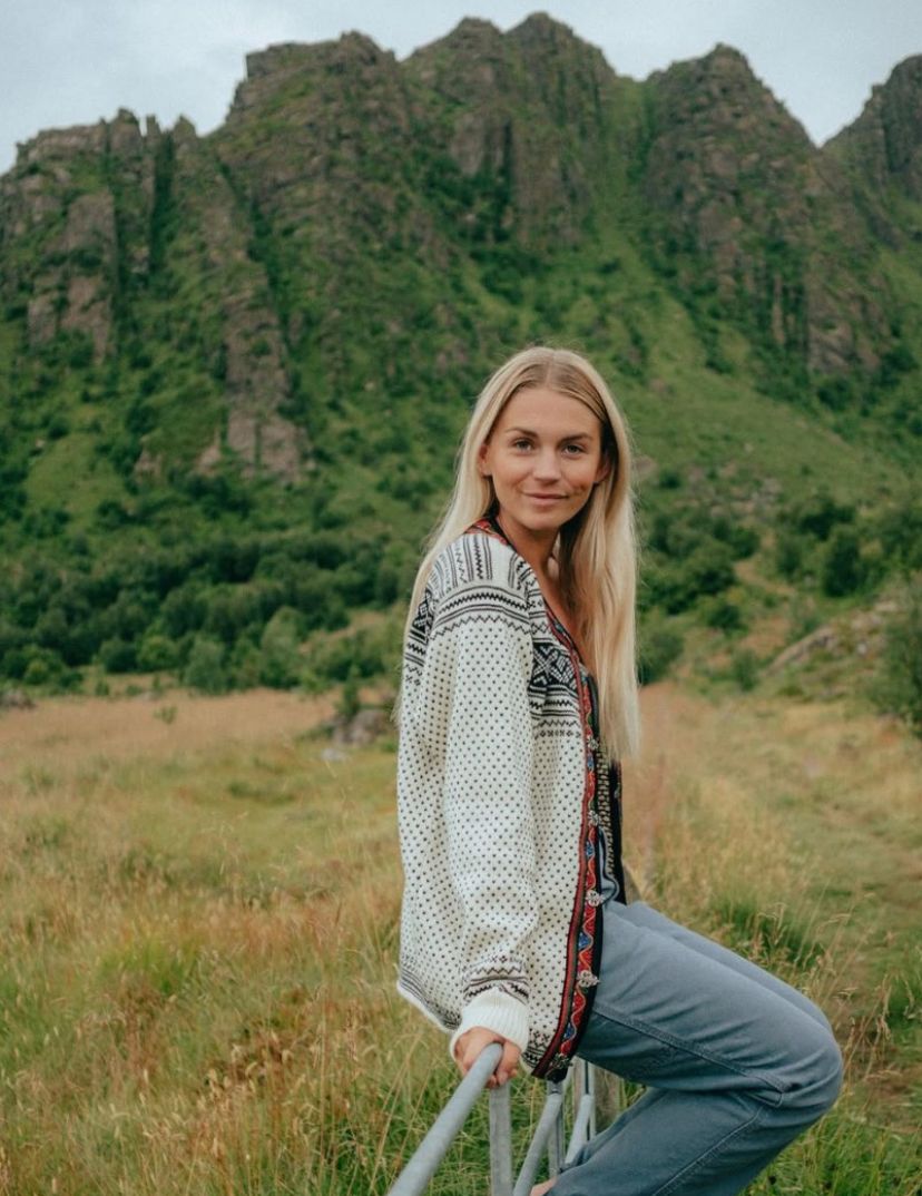 Influencer Fie Agerskov in Lofoten wearing a wool sweater from Dale of Norway