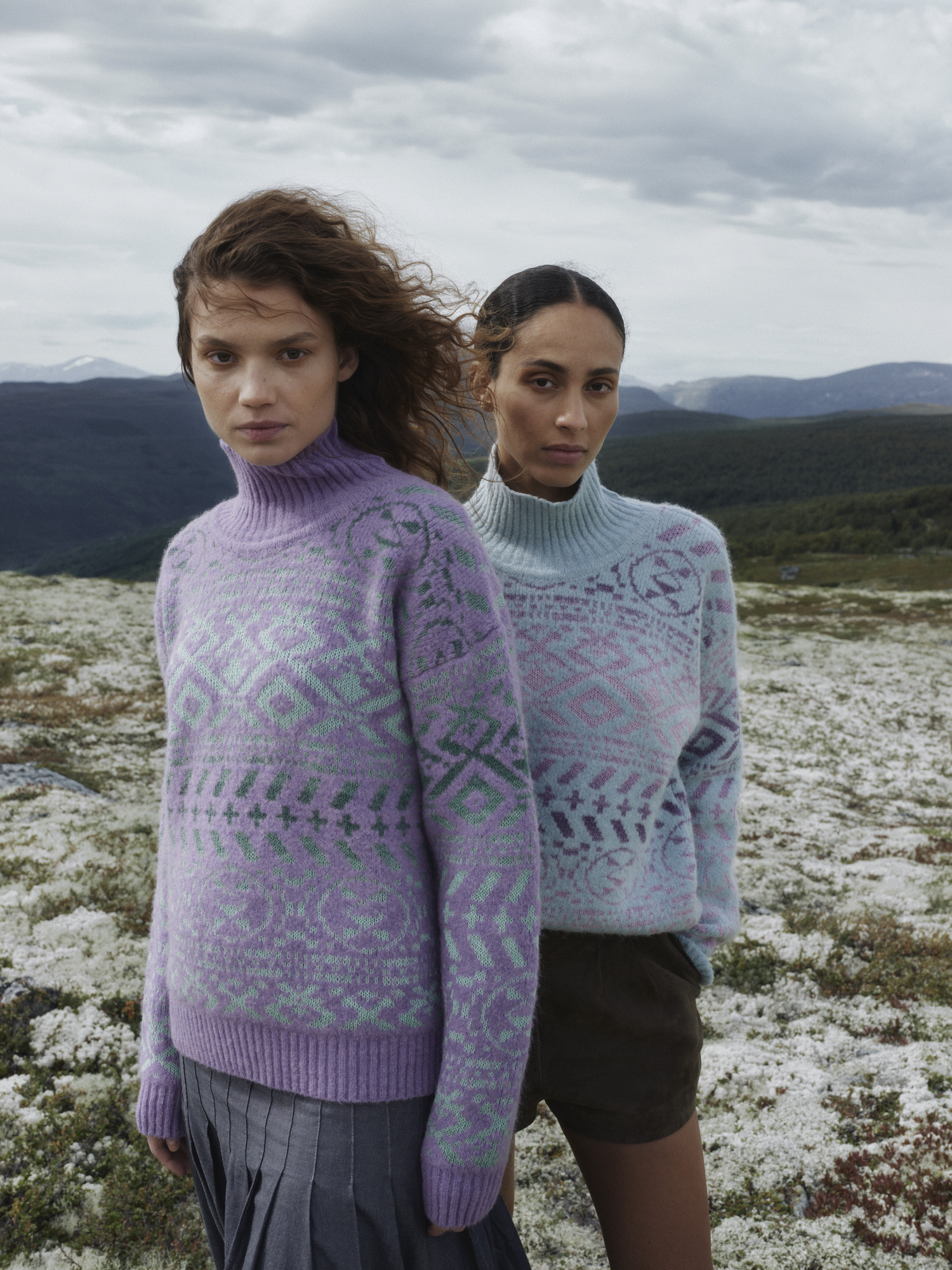Female models wearing Highland wool sweater from Dale of Norway